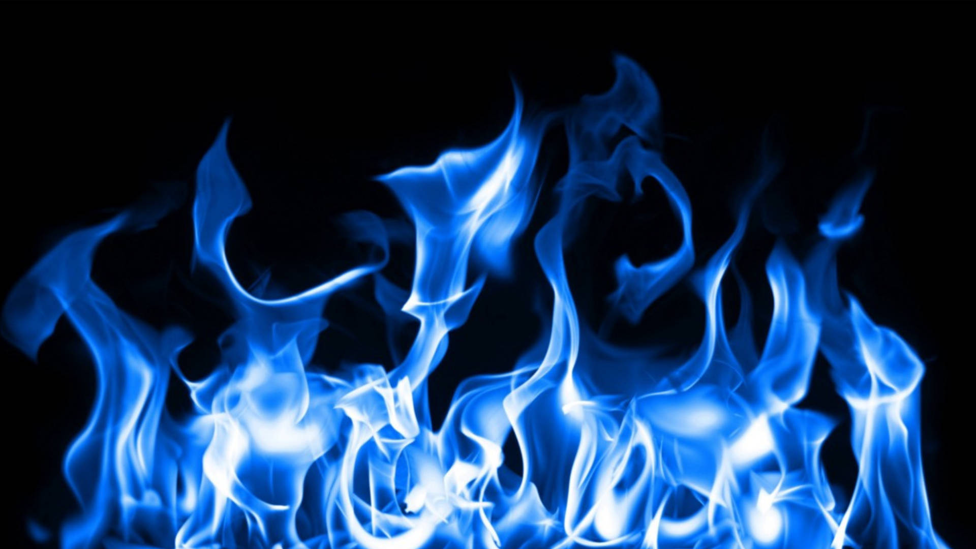 Flames 桌布 壁紙 — 鮮豔的藍色火焰在純黑背景上動態舞動，營造出強烈的視覺對比。