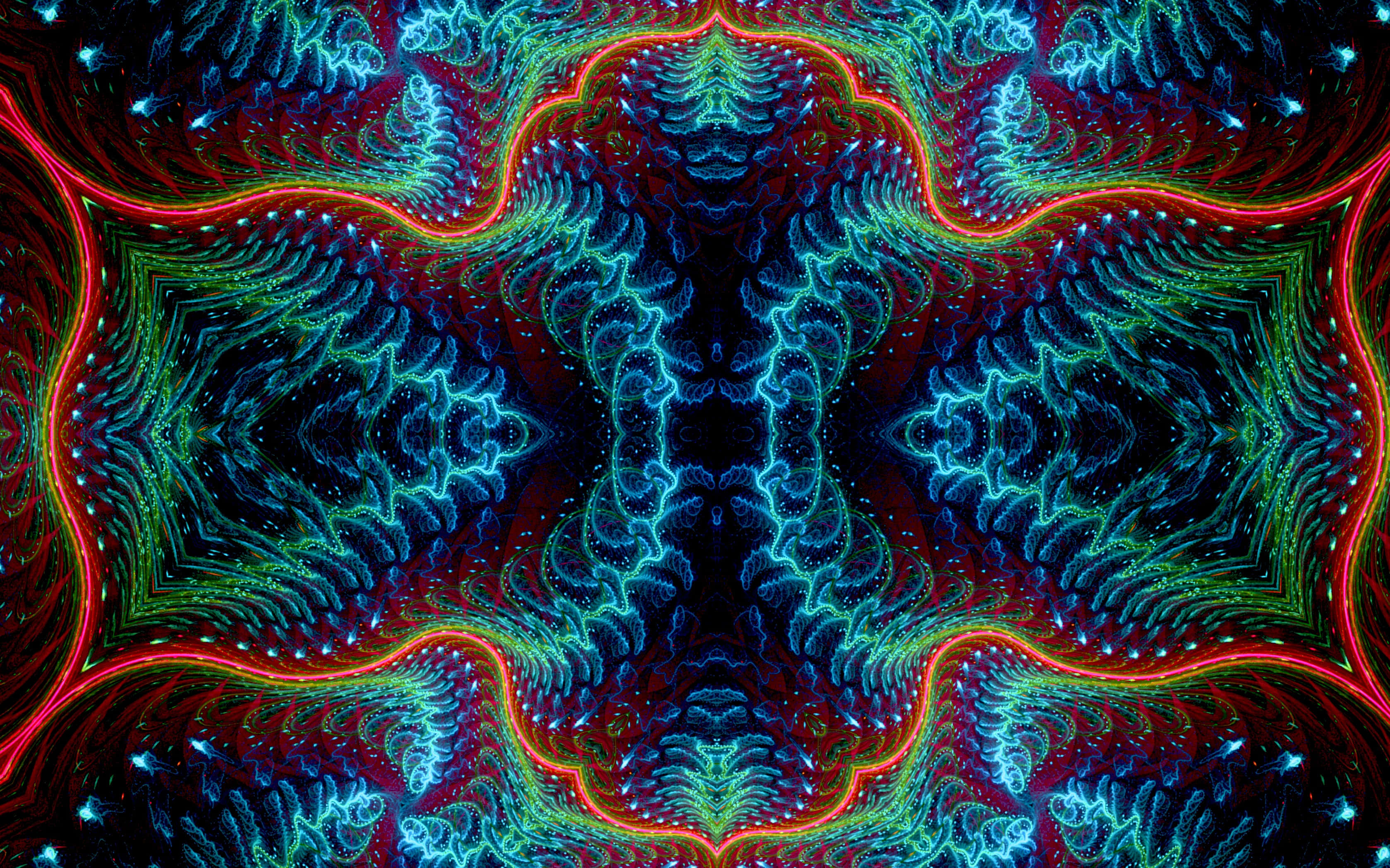 Psychedelic Fractals 桌布 壁紙 — 鮮豔的霓虹色碎形圖案在深色背景上以對稱波浪形式輻射開來。