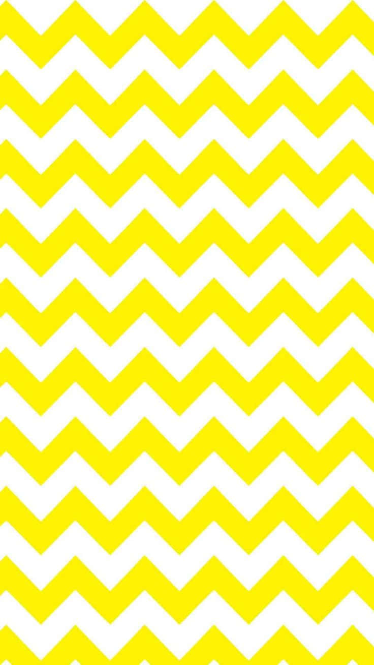Yellow Pattern 桌布 壁紙 — 鮮豔的黃白相間鋸齒圖案以大膽重複的V形設計填滿整個畫面。