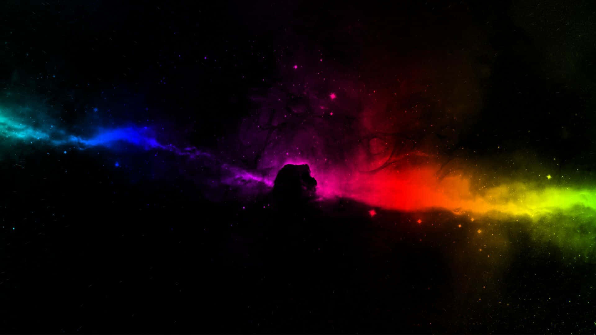 一個色彩繽紛的星雲，背景是星空，前景是山脈剪影。