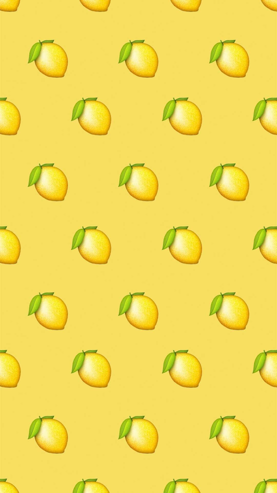 Aesthetic Yellow 桌布 壁紙 — 鮮黃色的檸檬和綠葉在陽光黃色的背景上以歡快的網格重複。