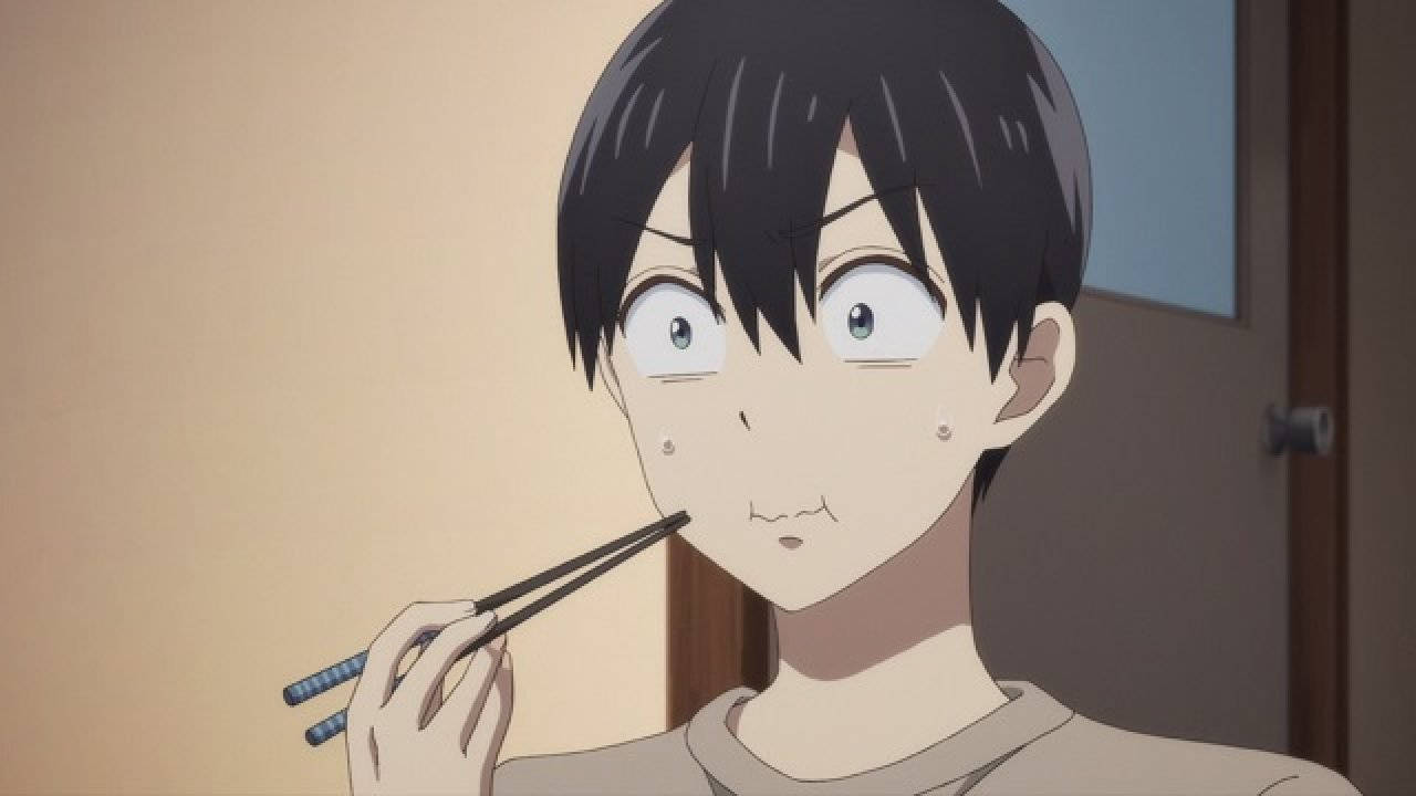 動漫男孩睜大眼睛，在室內將筷子靠近嘴邊。