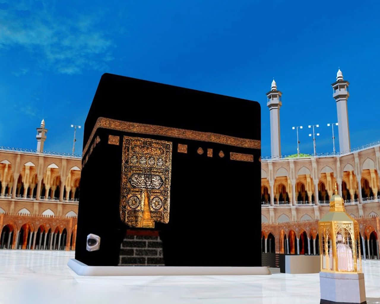 Makkah 桌布 壁紙 — 麥加的克爾白在清澈的藍天下，黑色布幔上有精緻的金色刺繡，周圍是清真寺建築。