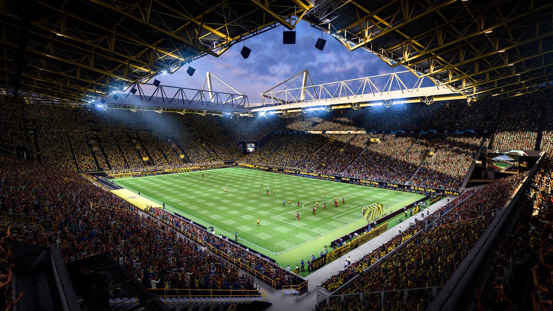 Dortmund 桌布 壁紙 — 黃昏時分，一個擠滿人的足球場，充滿活力的黃色球迷和明亮的泛光燈照亮了綠色球場。