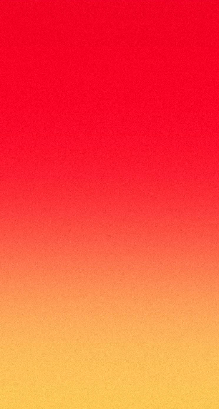 黃紅漸層 iPhone 5s 壁紙 — 平滑的垂直漸變從頂部的鮮紅色過渡到底部的暖黃色。