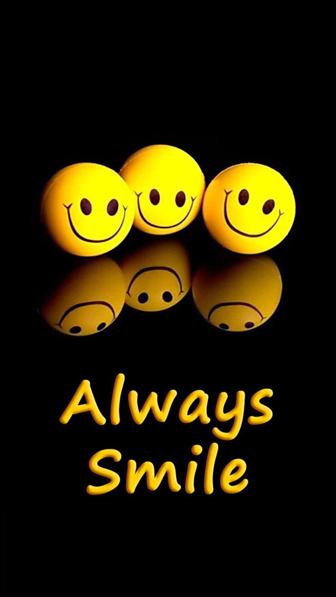 三個黃色笑臉球帶有反射，黑色背景上寫著 'Always Smile' 文字。