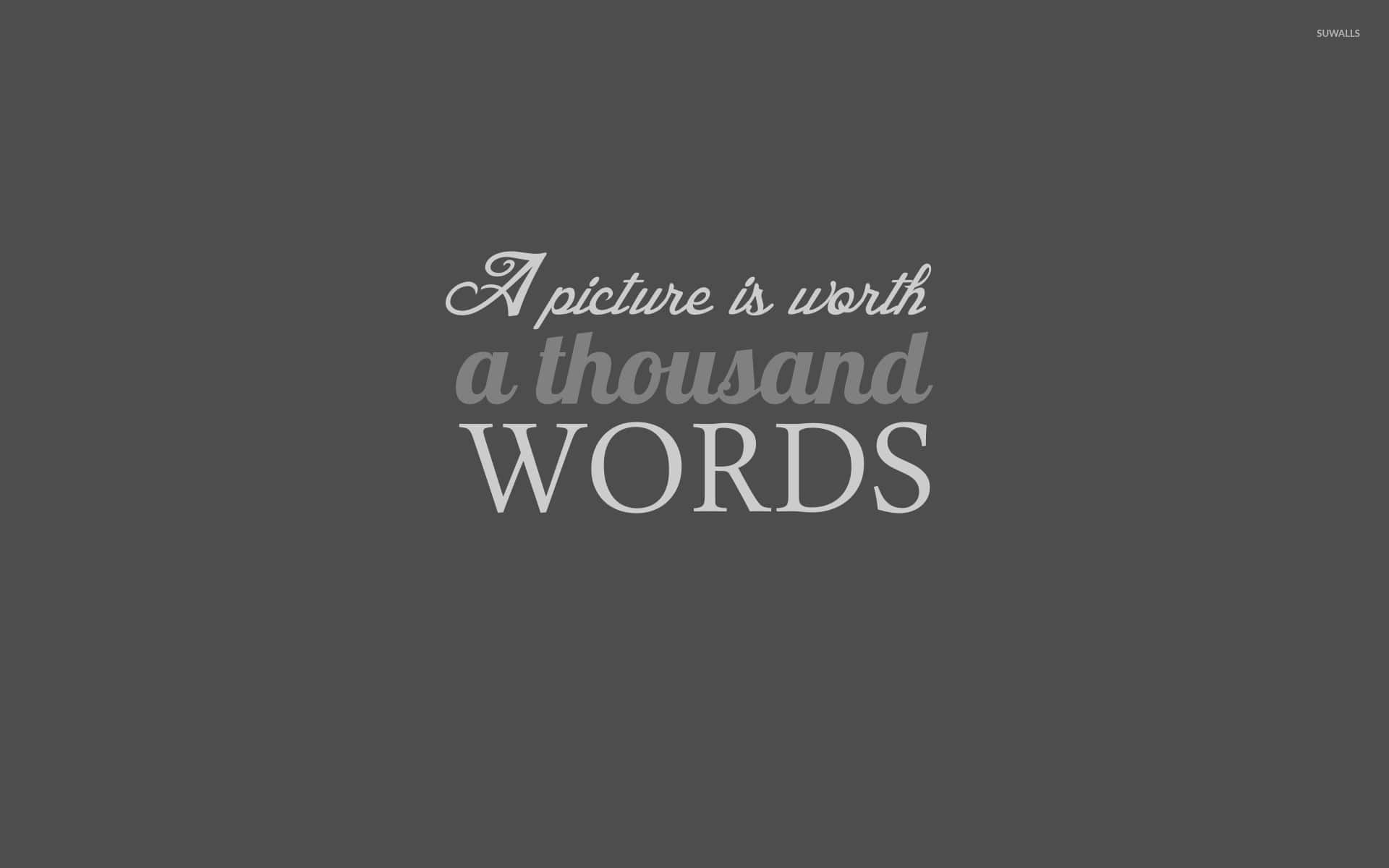 灰色背景上的文字引用，寫着 'A picture is worth a thousand WORDS'。