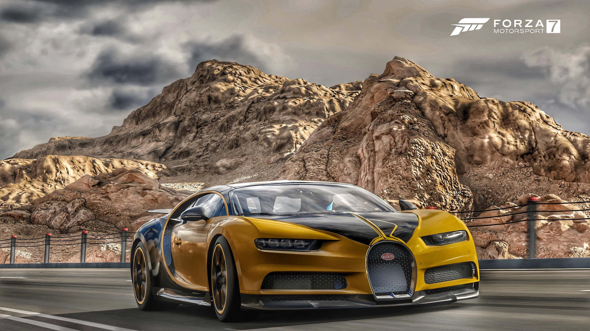 黃黑相間的Bugatti Chiron在沙漠高速公路上與岩石山脈競速。