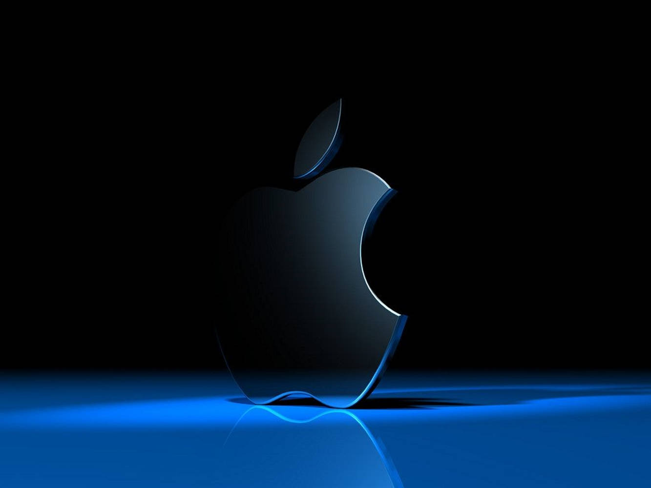 時尚的黑色Apple標誌在反光表面上發出藍光。