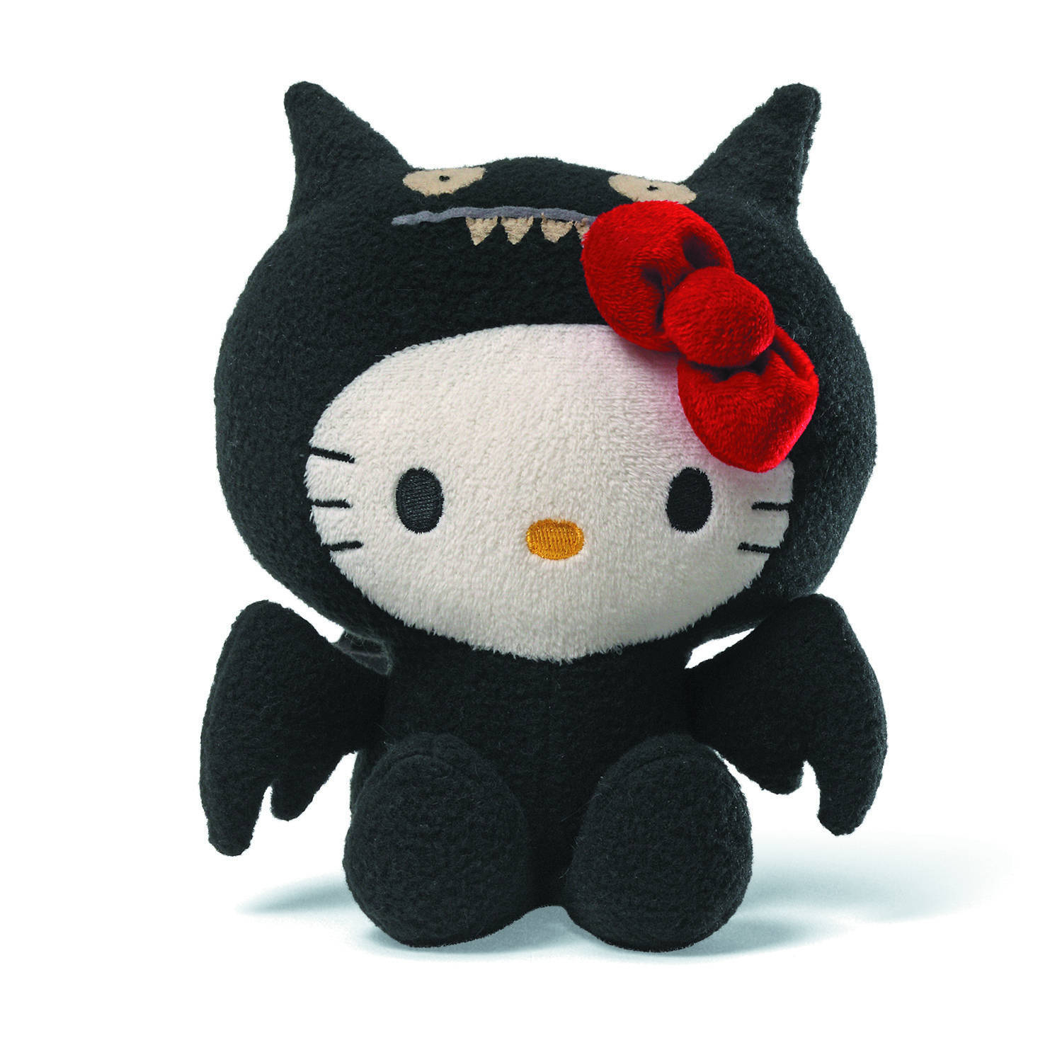 黑吸血鬼Hello Kitty萬聖節 壁紙 — 一隻毛絨Hello Kitty打扮成黑色蝙蝠，戴著紅色蝴蝶結和縫製的尖牙，背景為白色。
