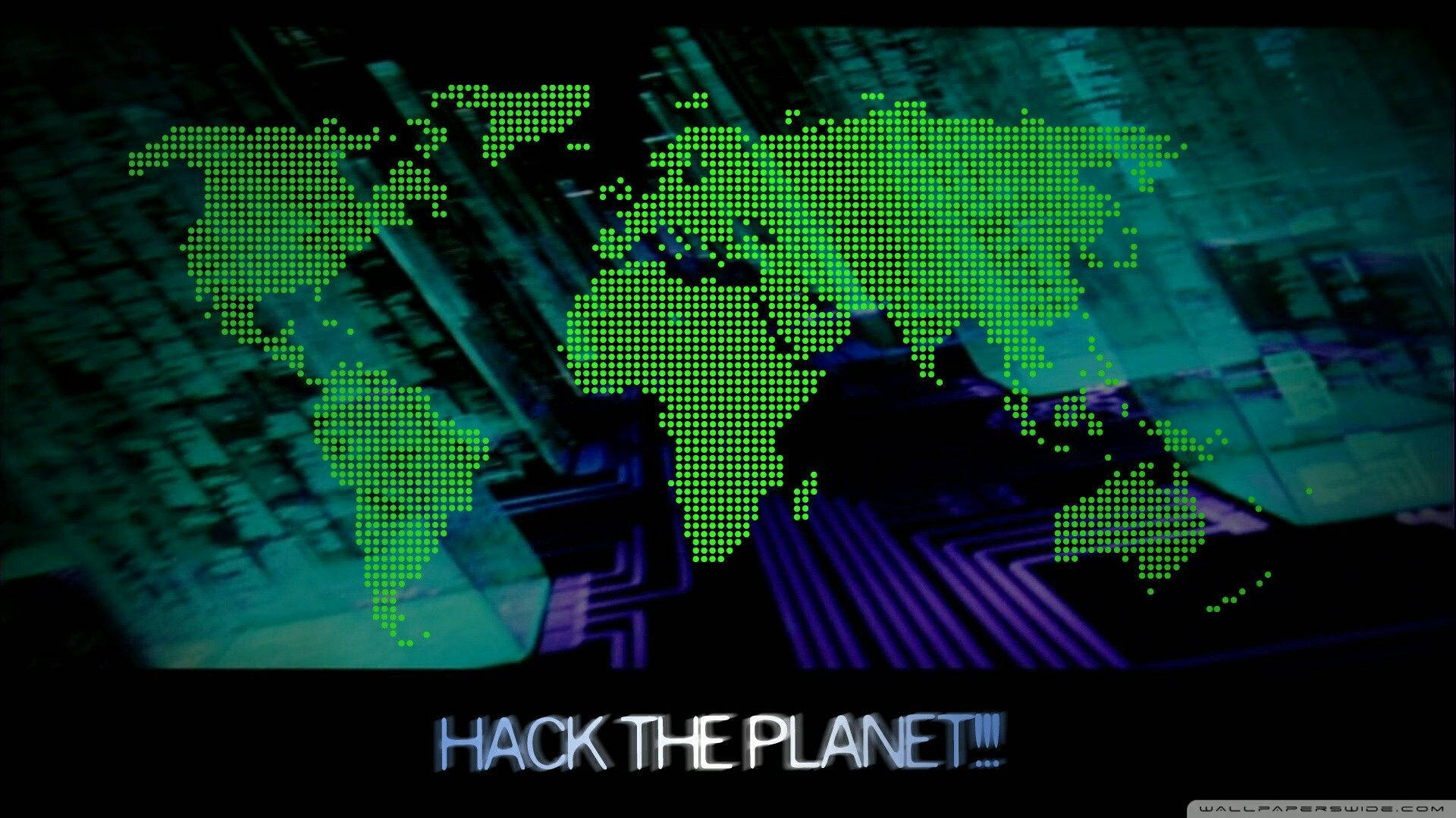 發光綠色像素世界地圖在電路板上，附有 hack the planet 文字。