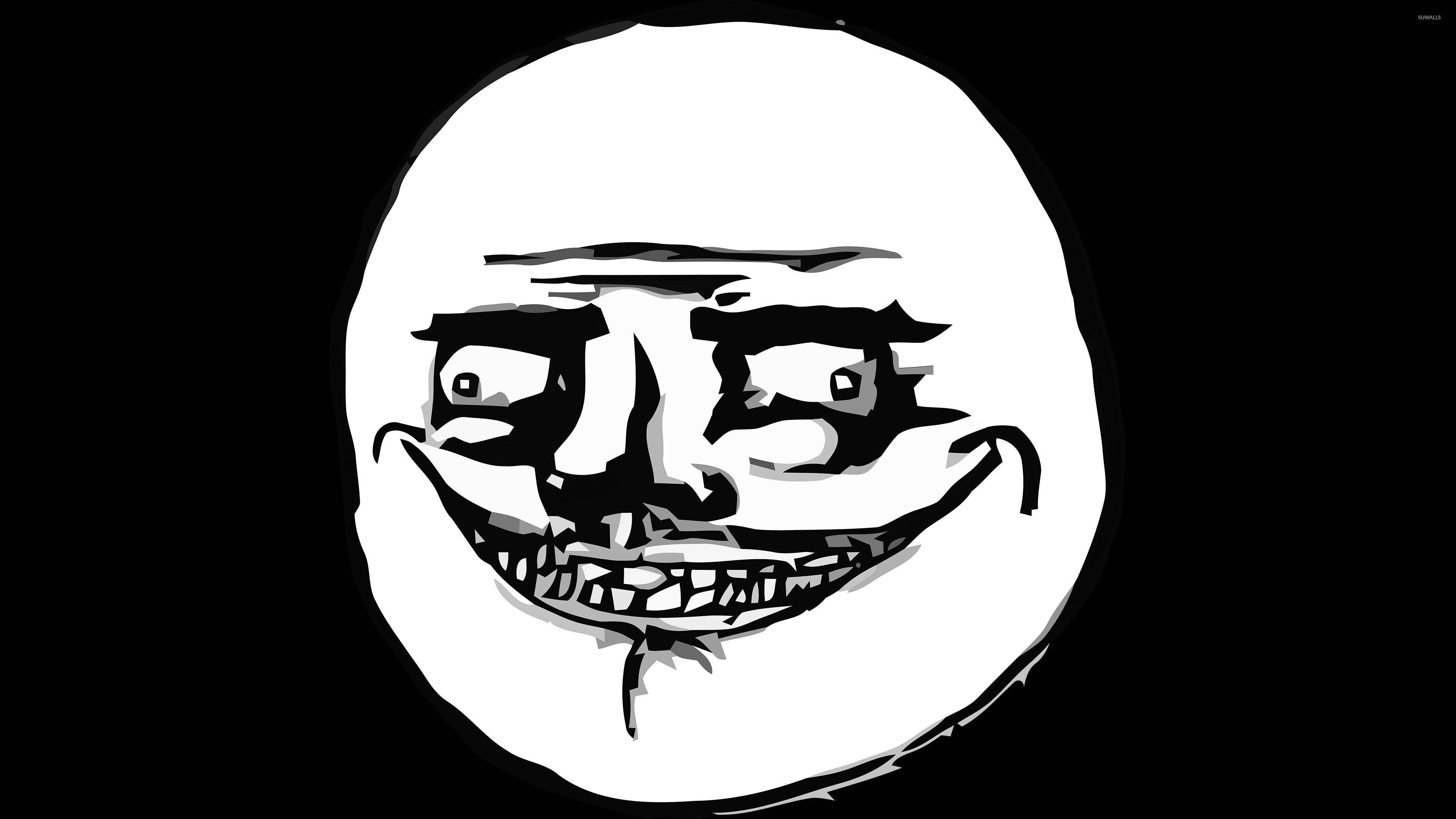 黑底搞笑模因臉 壁紙 — 一幅鮮明的黑白插圖，描繪了標誌性的「troll face」迷因，有著寬闊的笑容和銳利的眼神。
