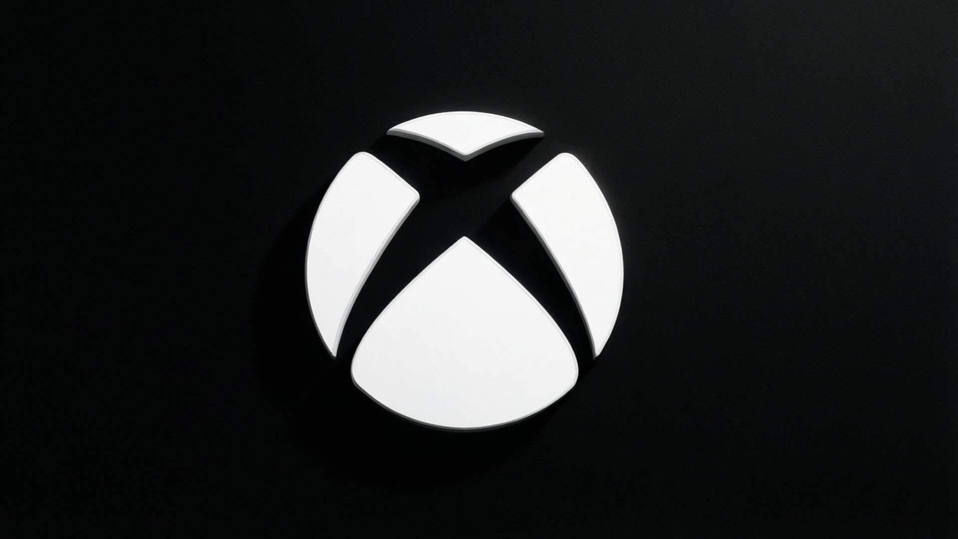 黑色背景上的白色Xbox標誌，帶有微妙陰影效果