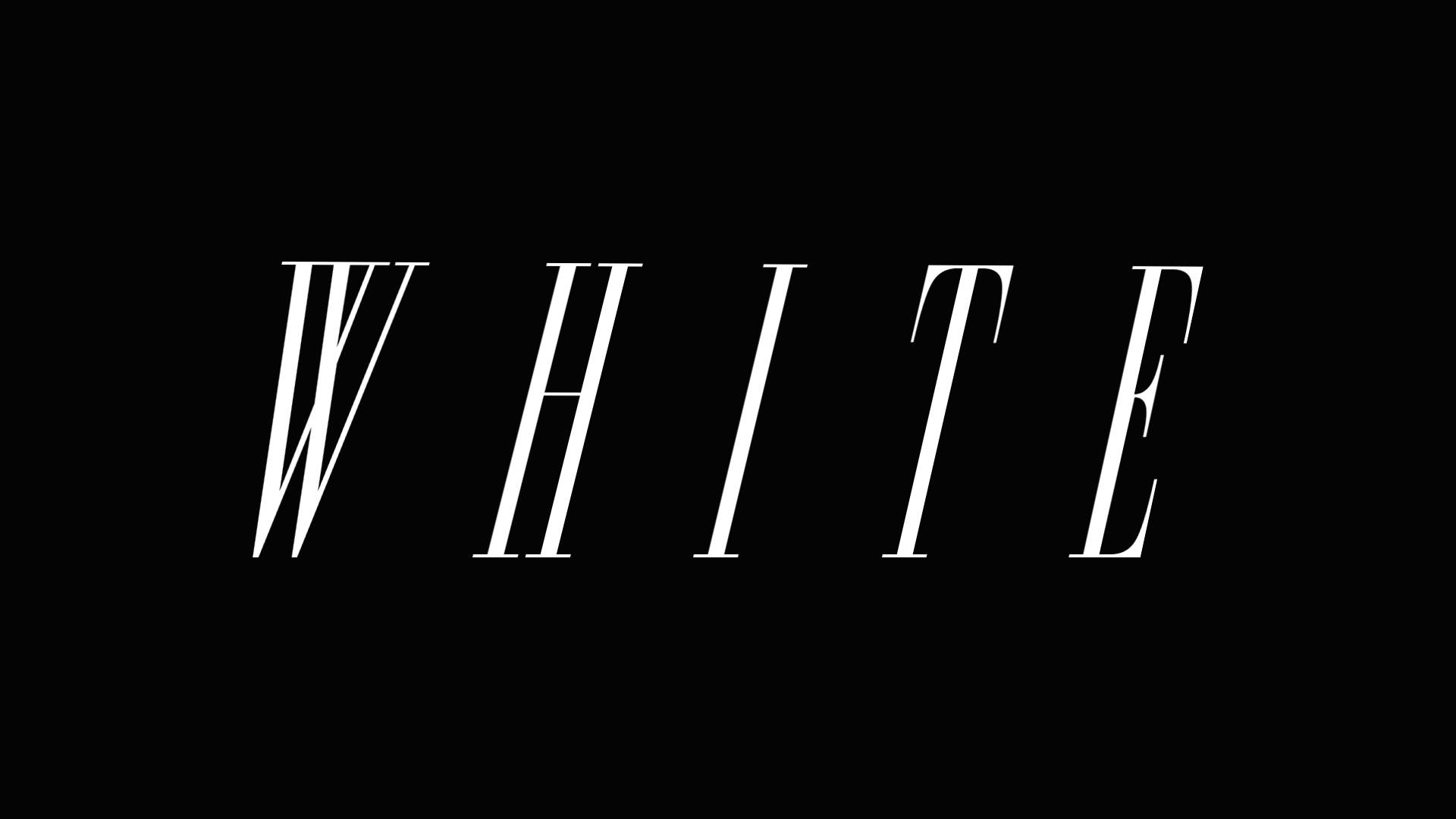 黑底米白 壁紙 — 單詞 white 以粗體白色襯線字體居中顯示在純黑色背景上。