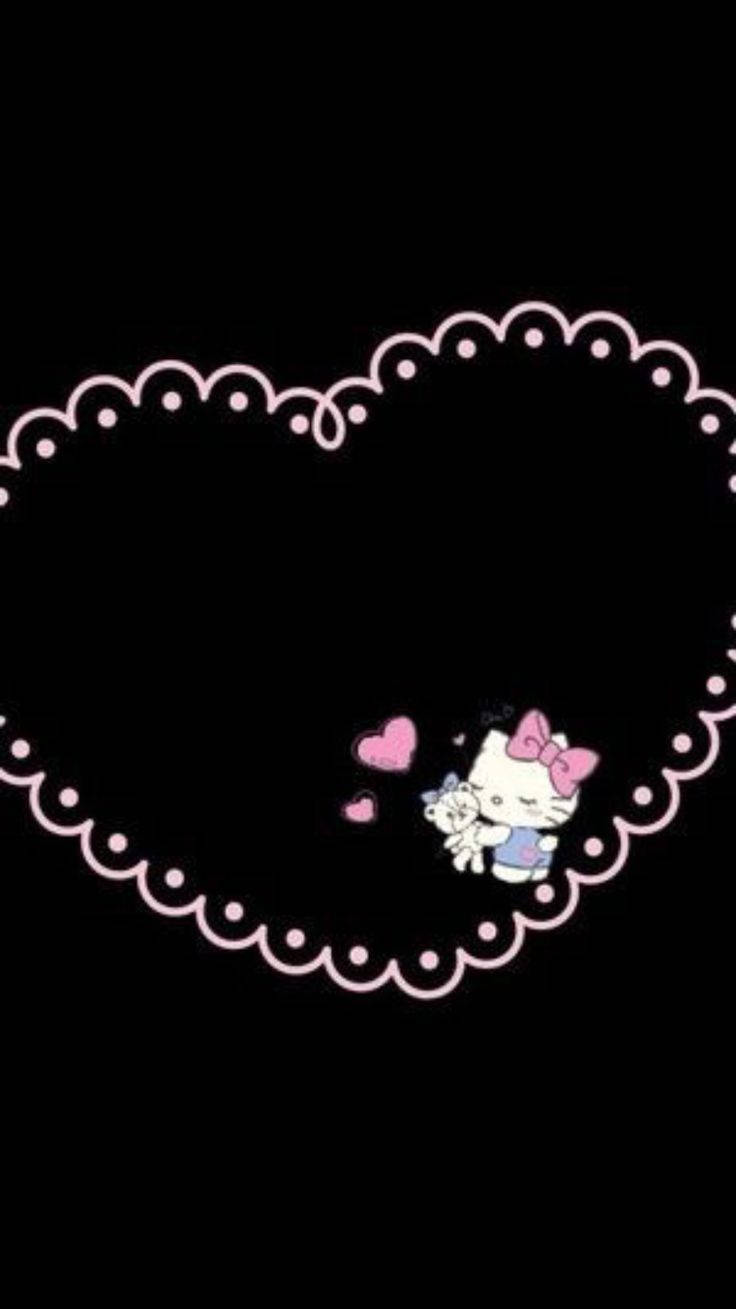黑愛 Hello Kitty 心形 壁紙 — Hello Kitty 在粉紅色心形框架中抱著一隻小貓，背景為黑色，有心形漂浮。