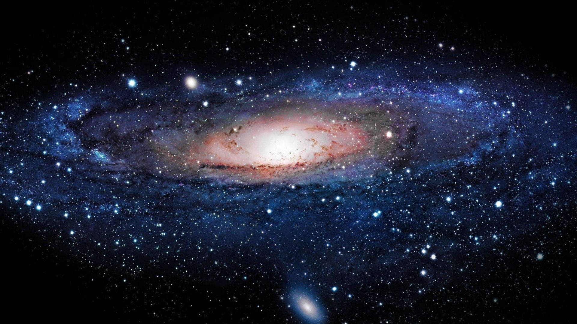 一個螺旋星系，擁有藍色旋臂和粉紅色核心，周圍環繞著星星。