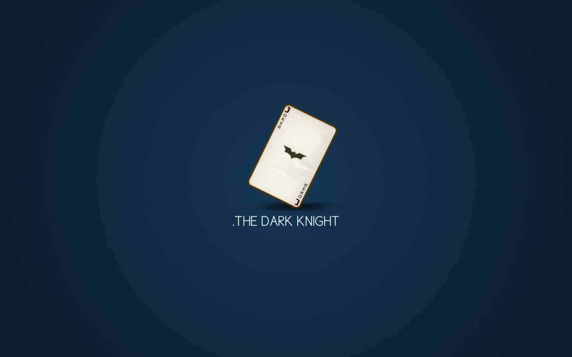 深藍色背景上帶有蝙蝠俠標誌和The Dark Knight文字的Joker卡