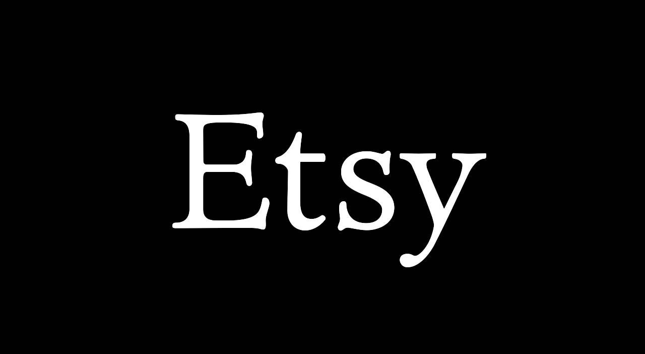 黑色背景上白色襯線字體的Etsy標誌