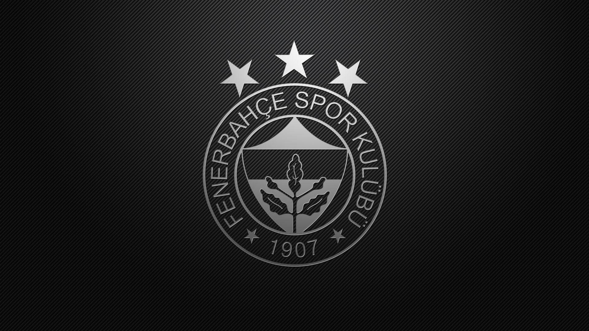 有紋理黑色背景上，帶有三粒星嘅Fenerbahçe Spor Kulübü標誌。