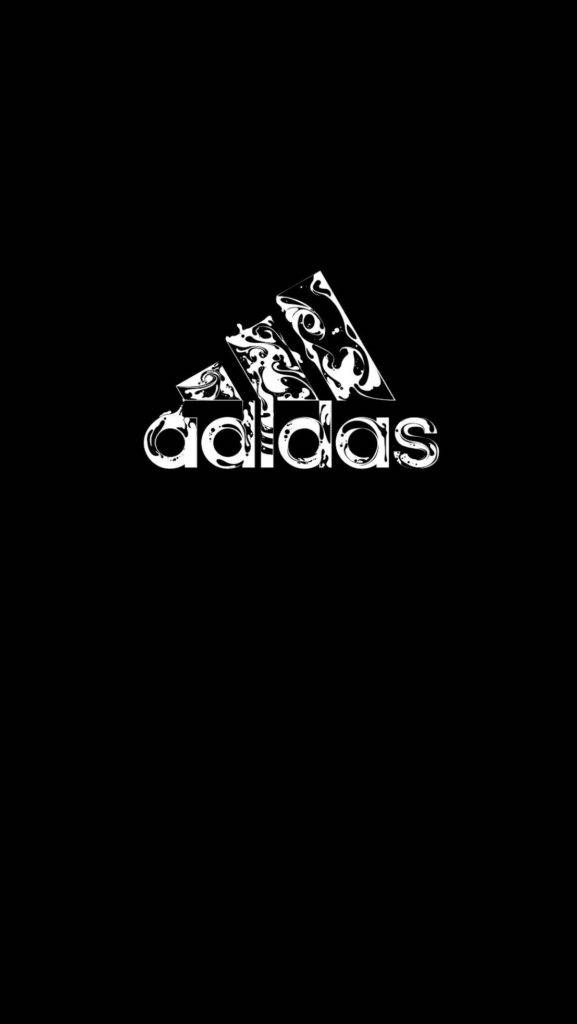 黑白阿迪達斯 iPhone 標誌 壁紙 — 一個風格化的白色Adidas標誌，在純黑色背景上帶有華麗圖案。