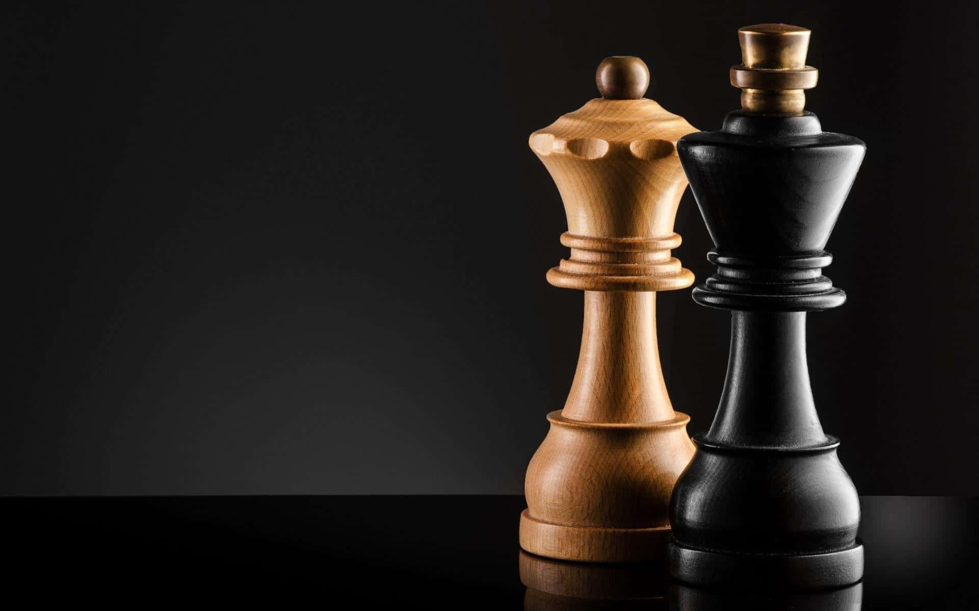 黑背景上的兩枚國際象棋棋子 壁紙