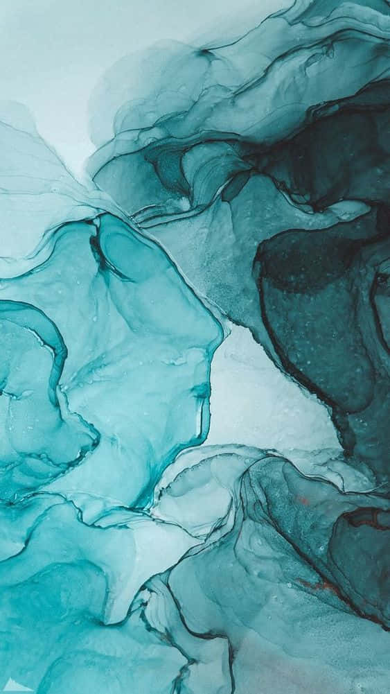 以有機圖案流動的抽象藍綠色和白色墨水漩渦。