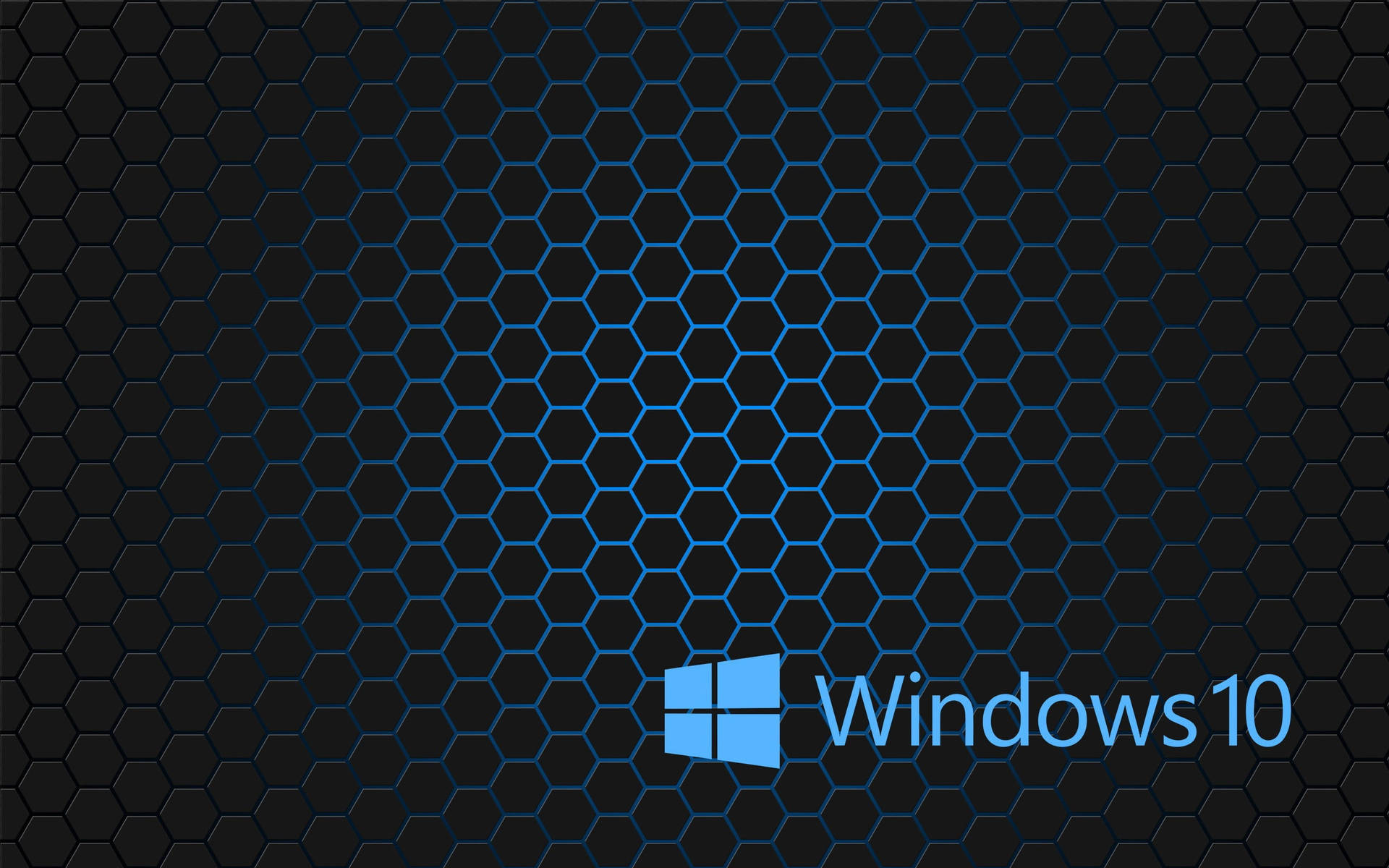 Windows 10標誌在深色六邊形圖案背景上，帶有藍色亮點。
