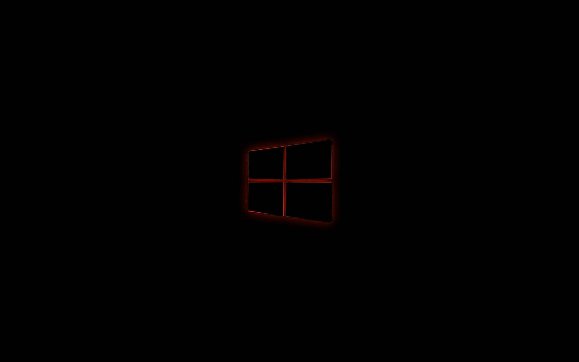 黑色背景上的紅色發光Windows標誌。