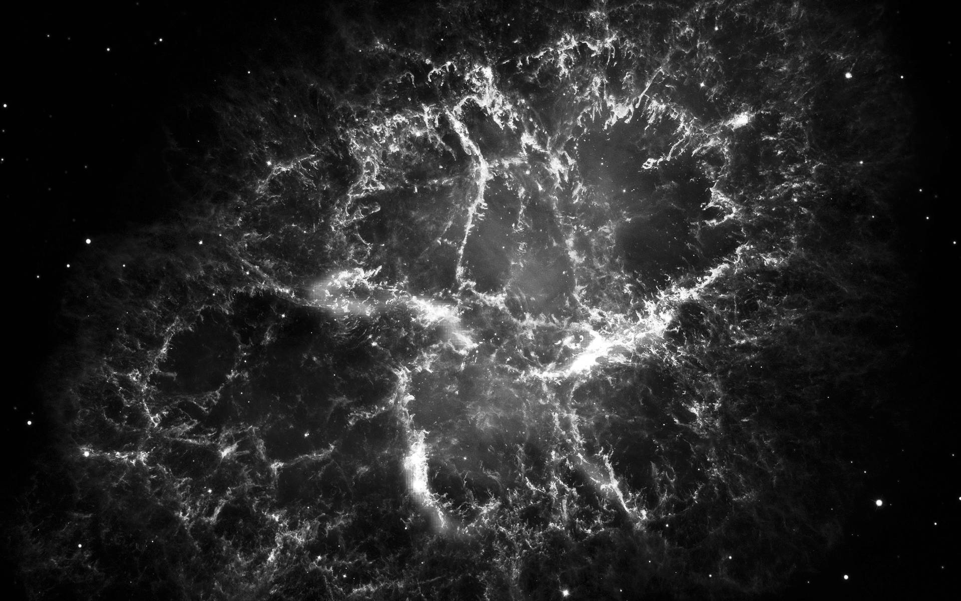 一個發光的宇宙星雲，帶有複雜的絲狀結構，背景是佈滿星星的黑色。