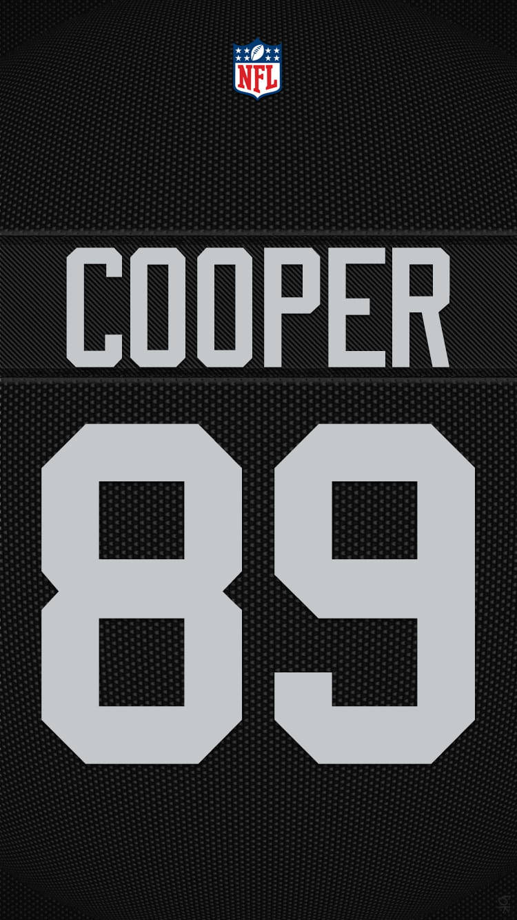 白色 桌布 壁紙 — 黑色NFL美式足球球衣特寫，上面有名字COOPER和號碼89，以粗體白色字體顯示。