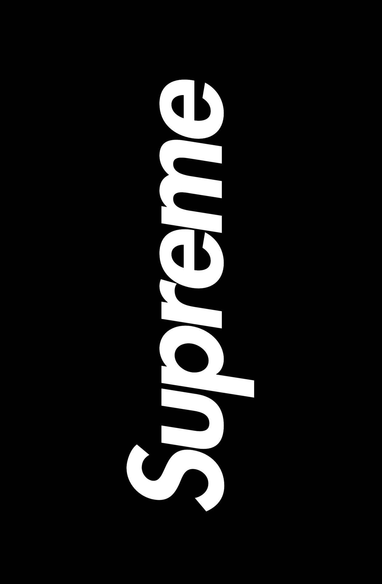 黑色Supreme配經典白色標誌 壁紙 — 粗體白色 'Supreme' 標誌垂直居中於純黑色背景上。