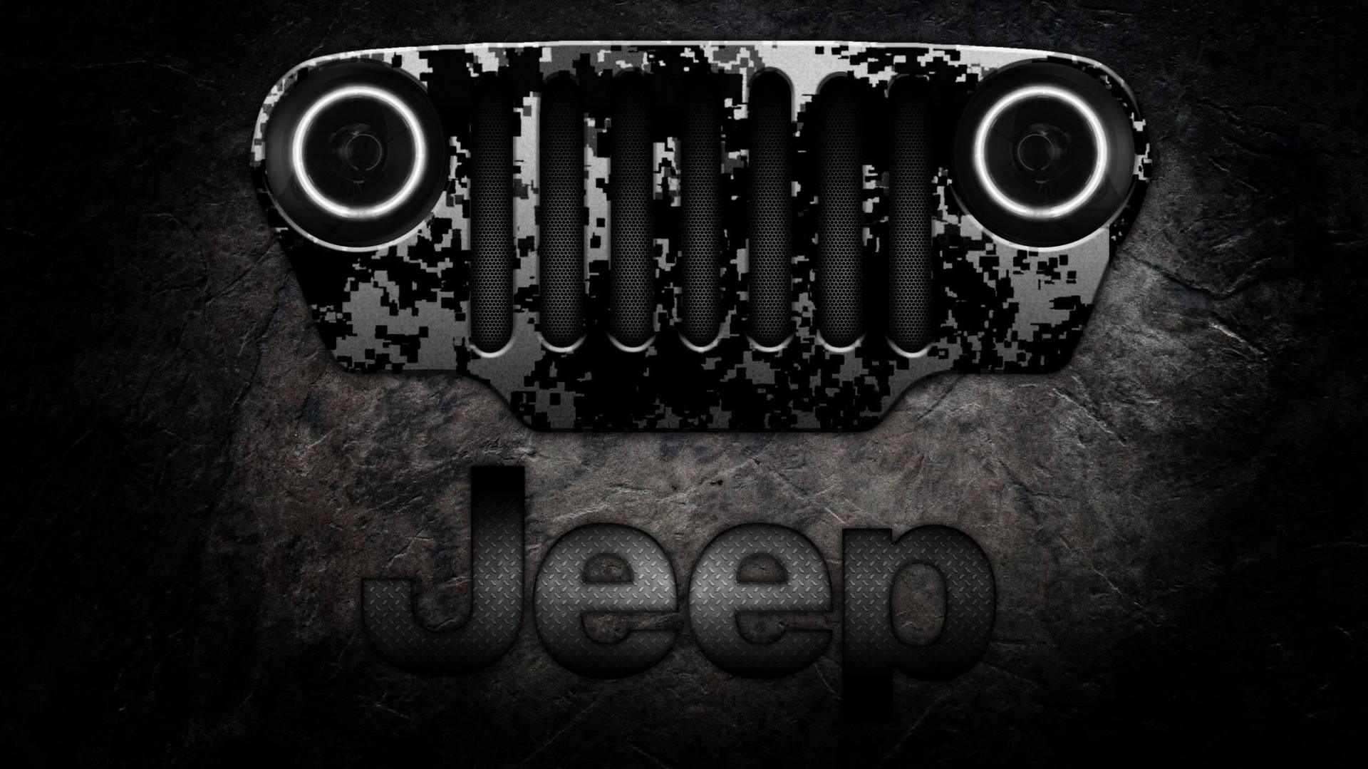 在深色石頭表面上的Jeep格柵，帶有發光的頭燈。