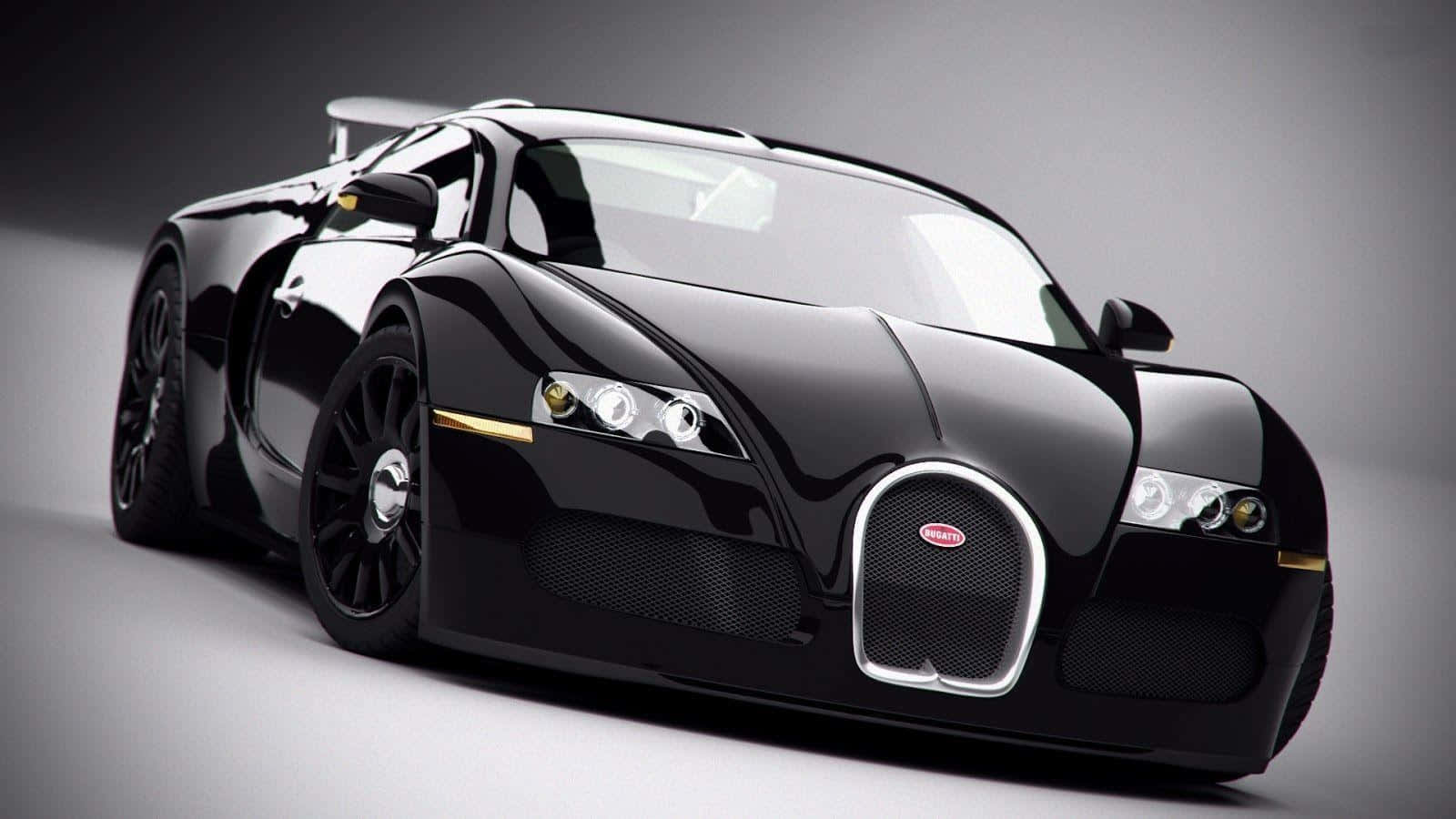 黑色布加迪Veyron高速跑車 壁紙 — 一輛時尚的黑色Bugatti Veyron跑車帶有金色點綴，在灰色背景下的攝影棚燈光中閃耀。