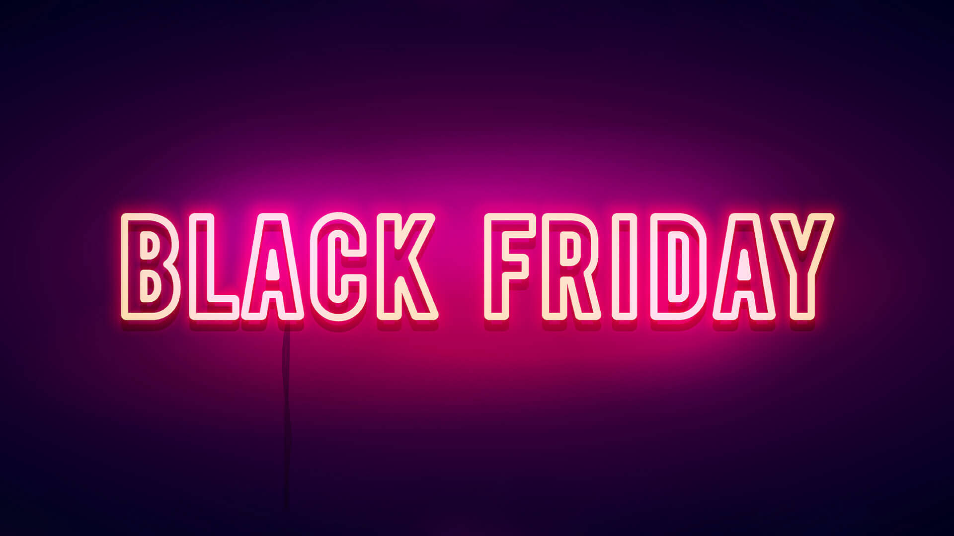 黑色星期五霓虹粉紅 壁紙 — 鮮豔的粉紅色霓虹燈牌寫著 BLACK FRIDAY，在深紫色漸變牆上發光。