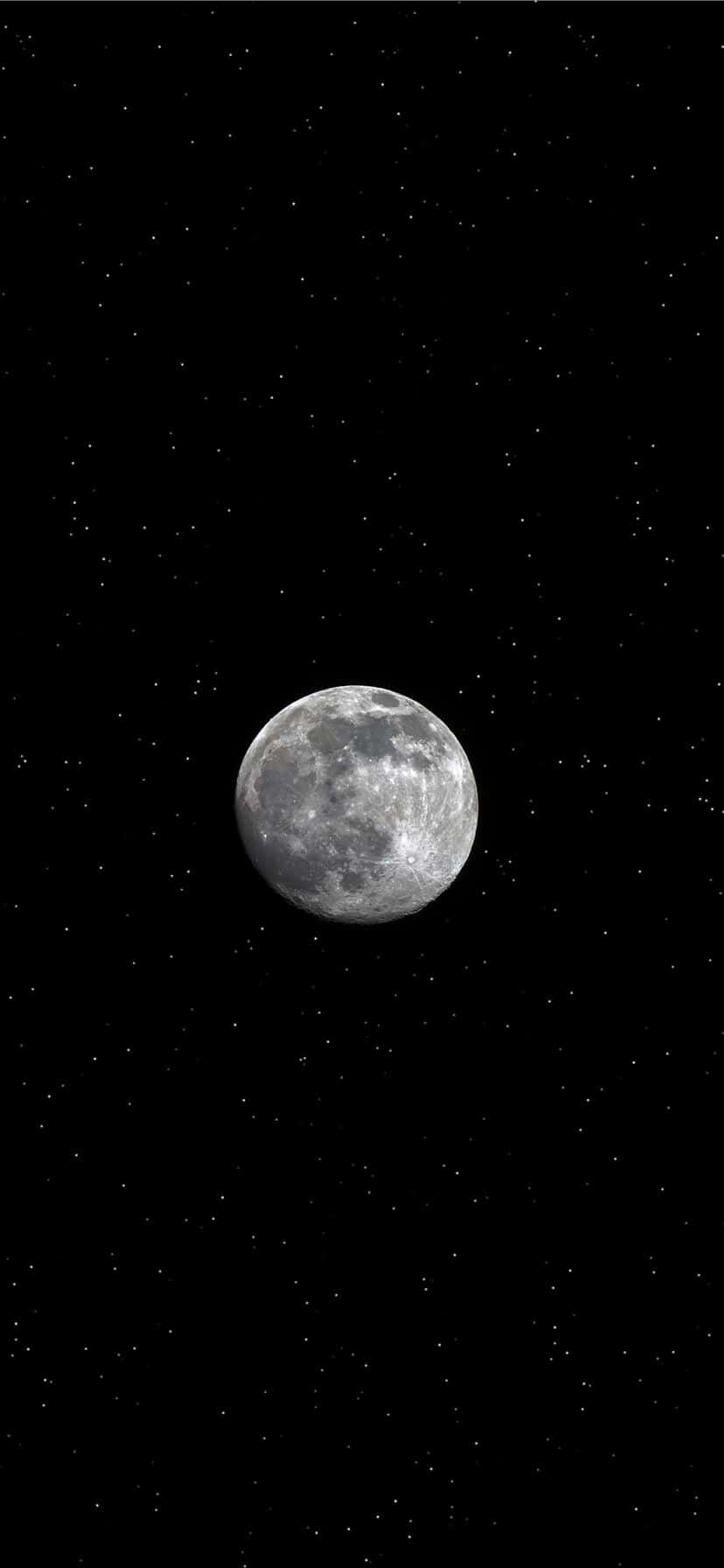 滿月帶有隕石坑，襯托著繁星點點的夜空