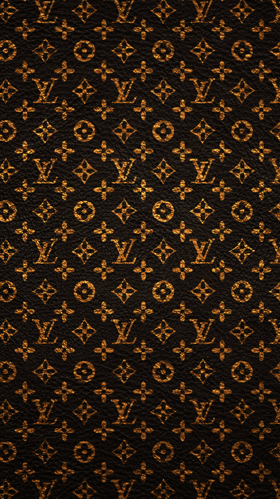 圖案 桌布 壁紙 — 黑色皮革表面的特寫，帶有重複的金色 Louis Vuitton 字母組合圖案，以經典奢華設計壓印。