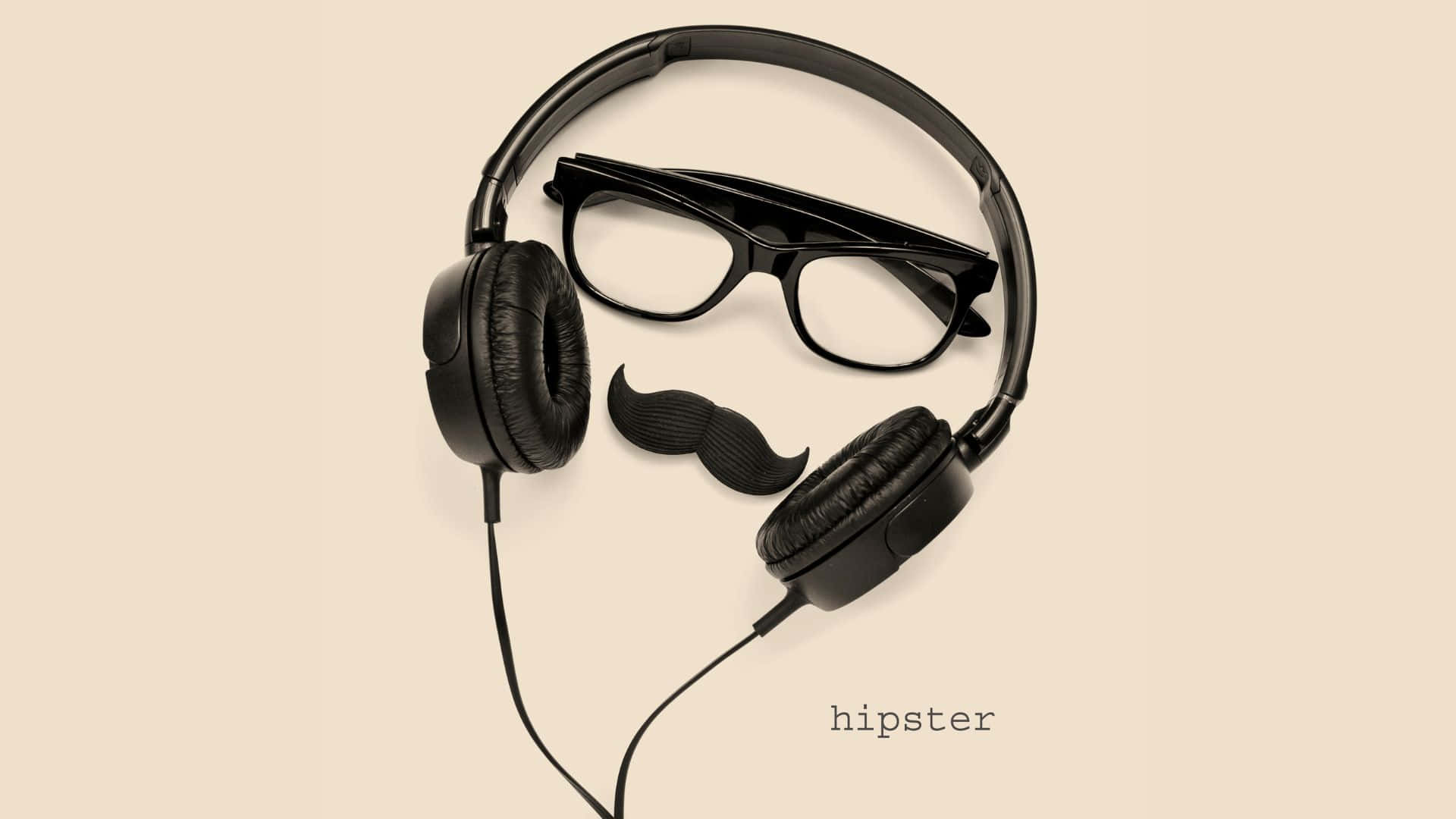Hipster 桌布 壁紙 — 黑色耳機、眼鏡和鬍子排列成一個嬉皮士面孔，背景為米色。