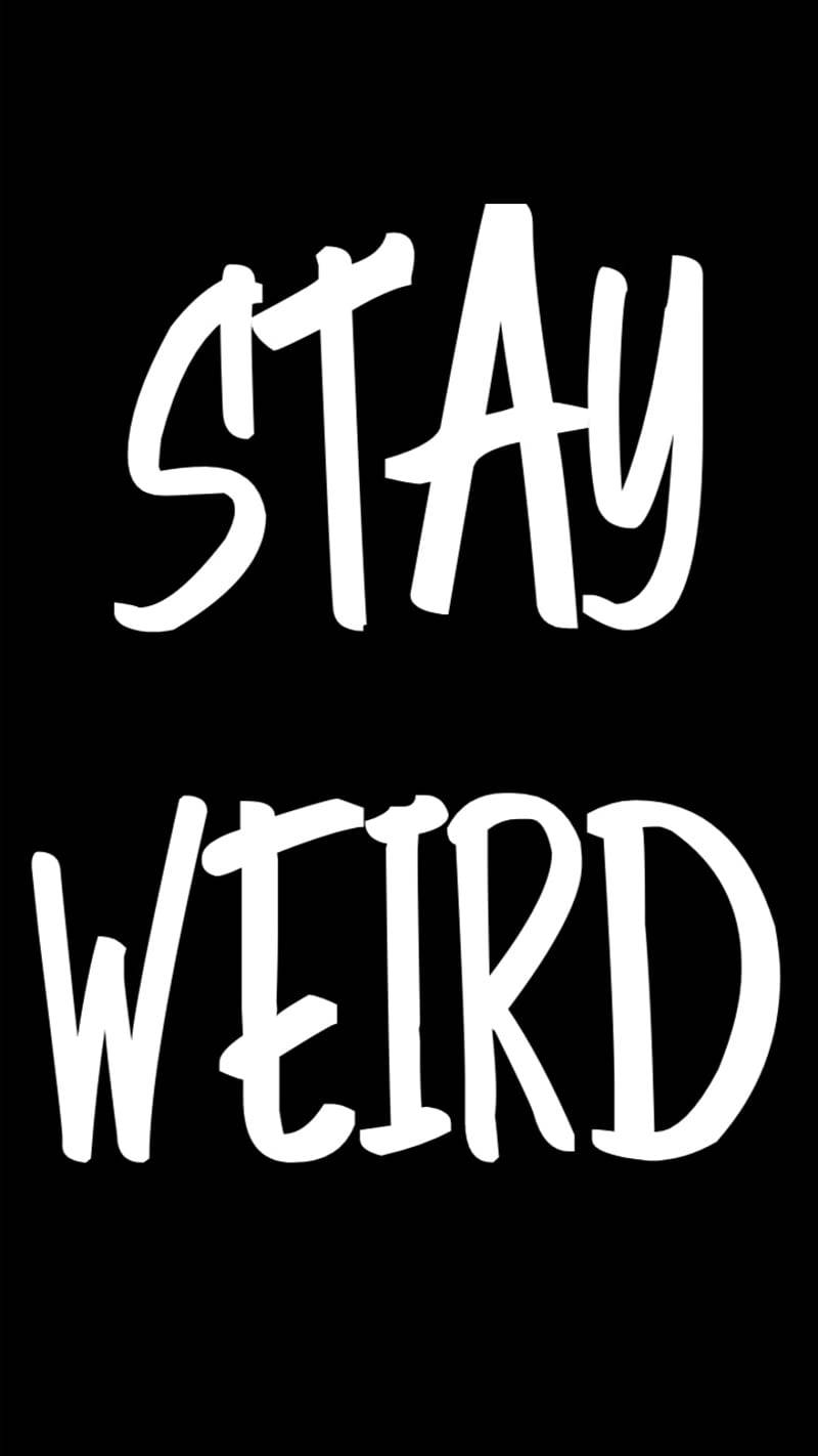 黑色背景「保持奇異」 壁紙 — 粗體白色手寫文字「STAY WEIRD」在純黑色背景上突出顯示。
