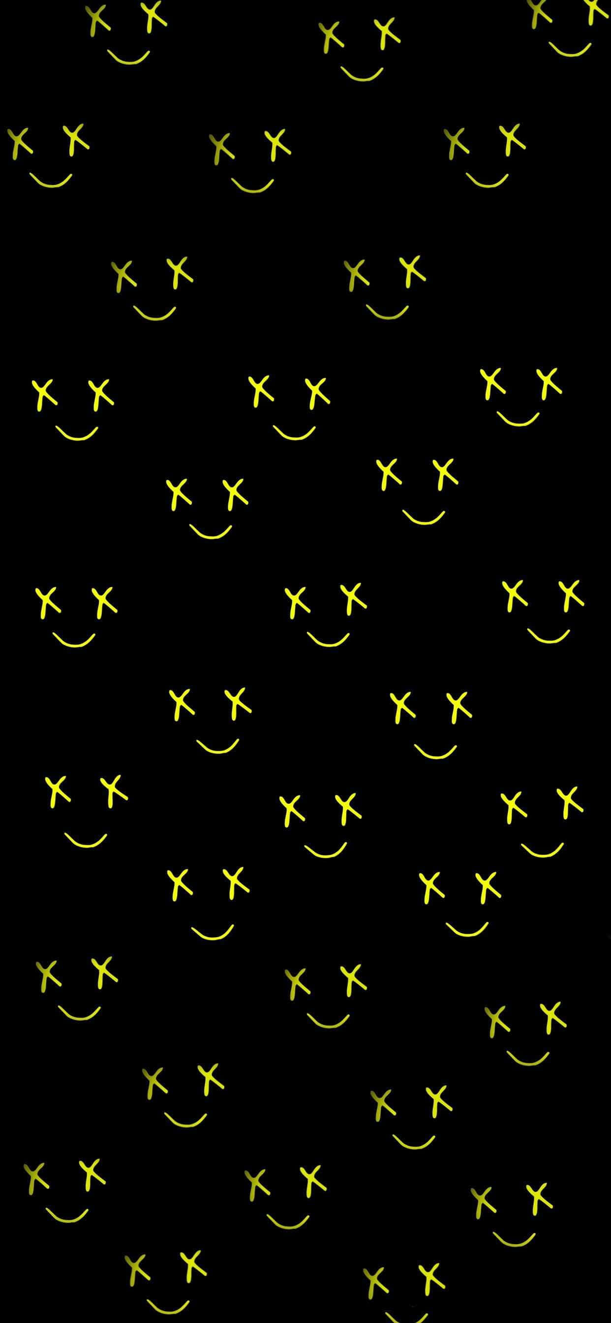 Aesthetic Smiley Face 桌布 壁紙 — 黑色背景上充滿了發光的黃色笑臉，帶有X形眼睛，以重複圖案散佈。