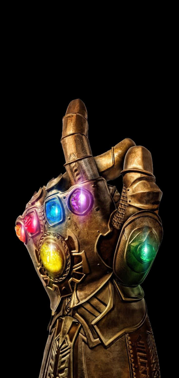 Infinity Gems 桌布 壁紙 — 黑色背景上帶有發光彩色寶石的無限手套特寫。