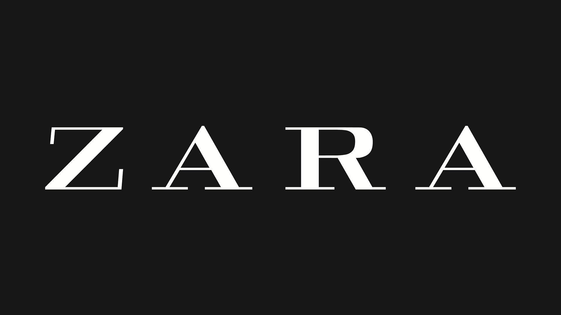 黑色背景上的白色ZARA標誌 壁紙 — 粗體白色 ZARA 字母居中於純黑色背景上，搭配簡潔極簡的字體設計。