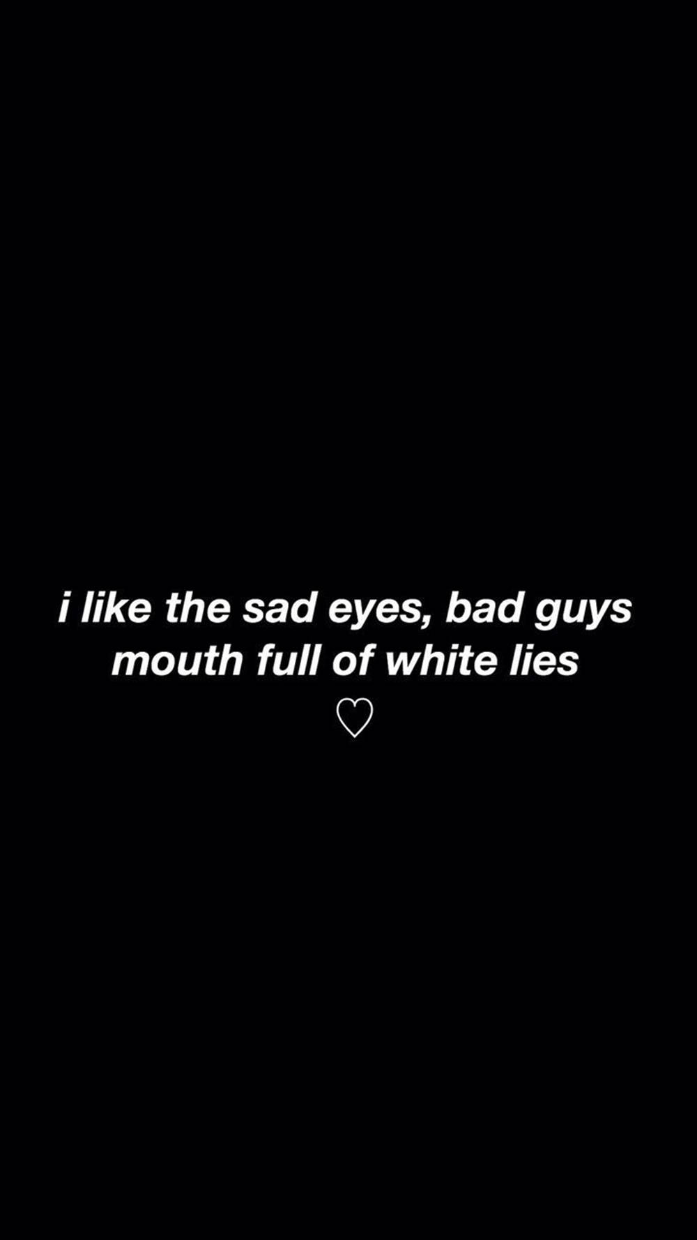 Tumblr 桌布 壁紙 — 黑色背景上的白色文字寫著「i like the sad eyes bad guys mouth full of white lies」，下方有一個心形。