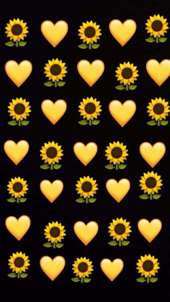 Yellow Heart 桌布 壁紙 — 黑色背景上的黃色向日葵和心形表情符號網格。