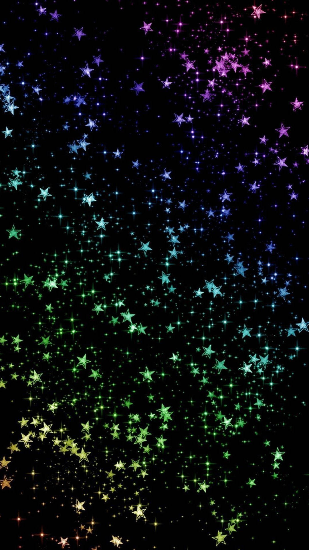 彩虹星星在閃爍的夜空中落下。