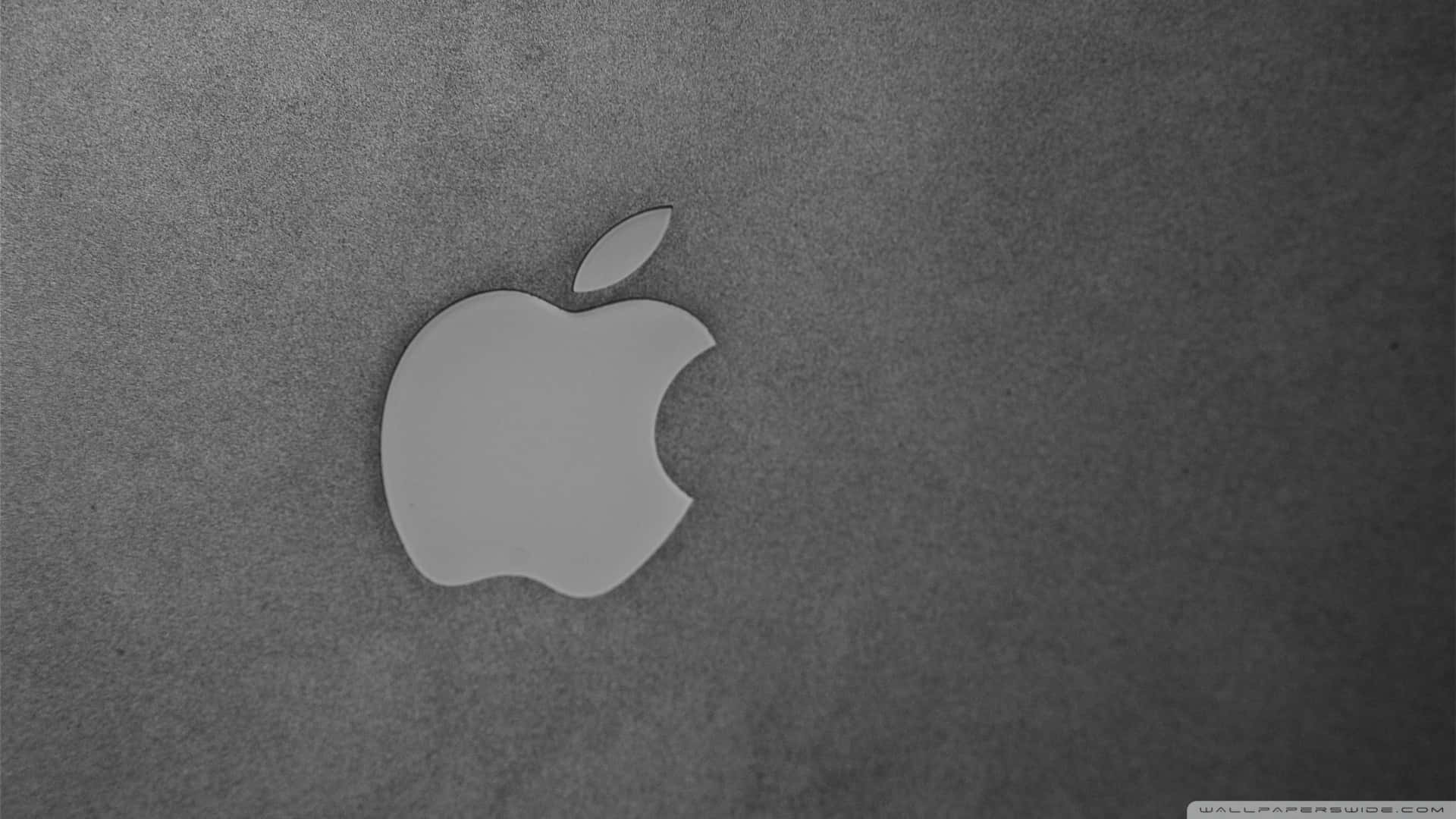 帶紋理灰色背景上的 Apple 標誌