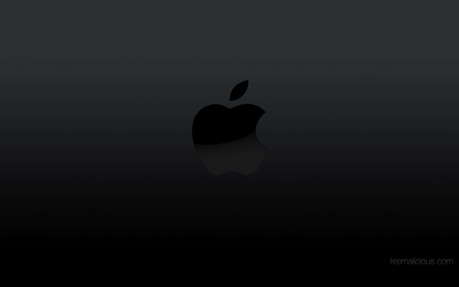 黑色Apple標誌在深色漸變背景上帶有反射。