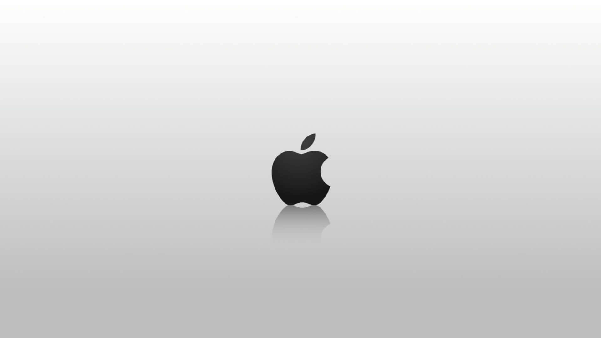 黑色Apple標誌在灰色漸變背景上帶有反射