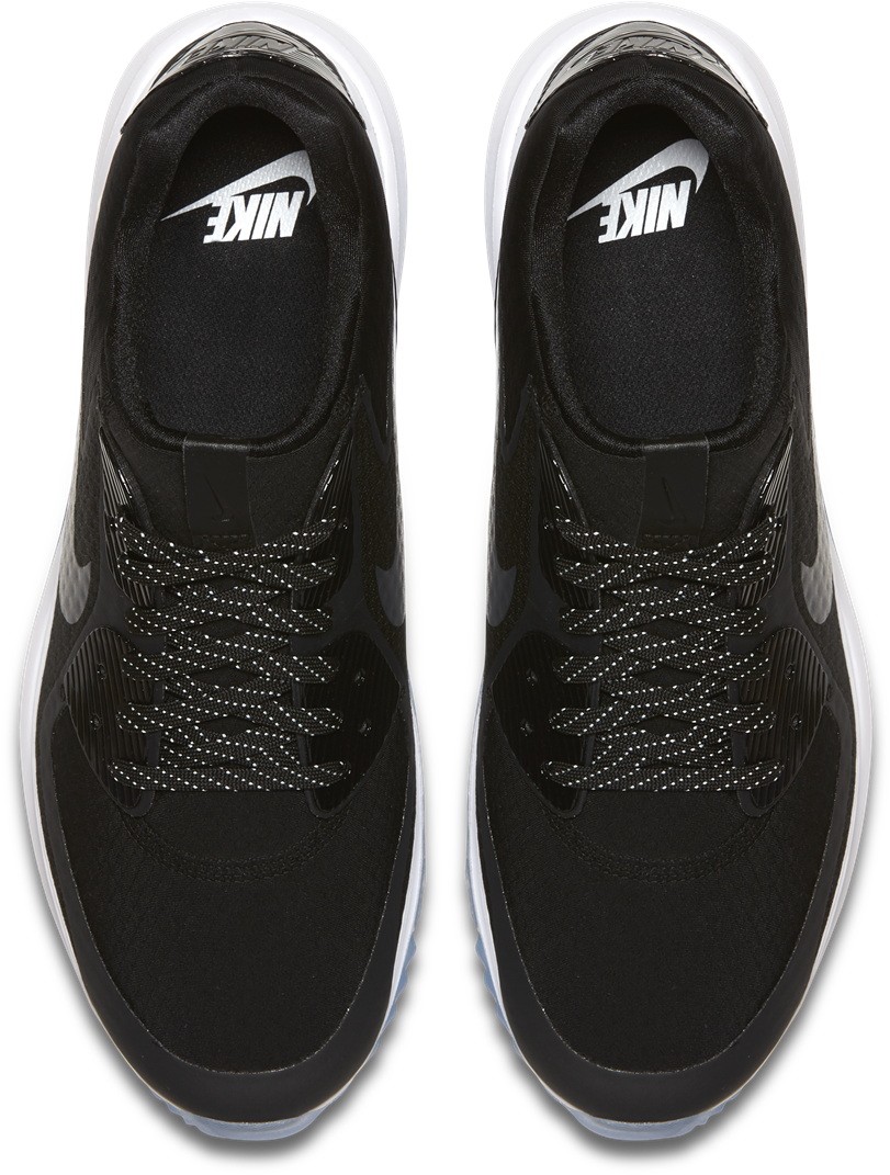 黑色運動鞋頂視圖 壁紙 — 黑色背景上，黑色Nike Air Max運動鞋的俯視圖，白色鞋底和反光鞋帶。