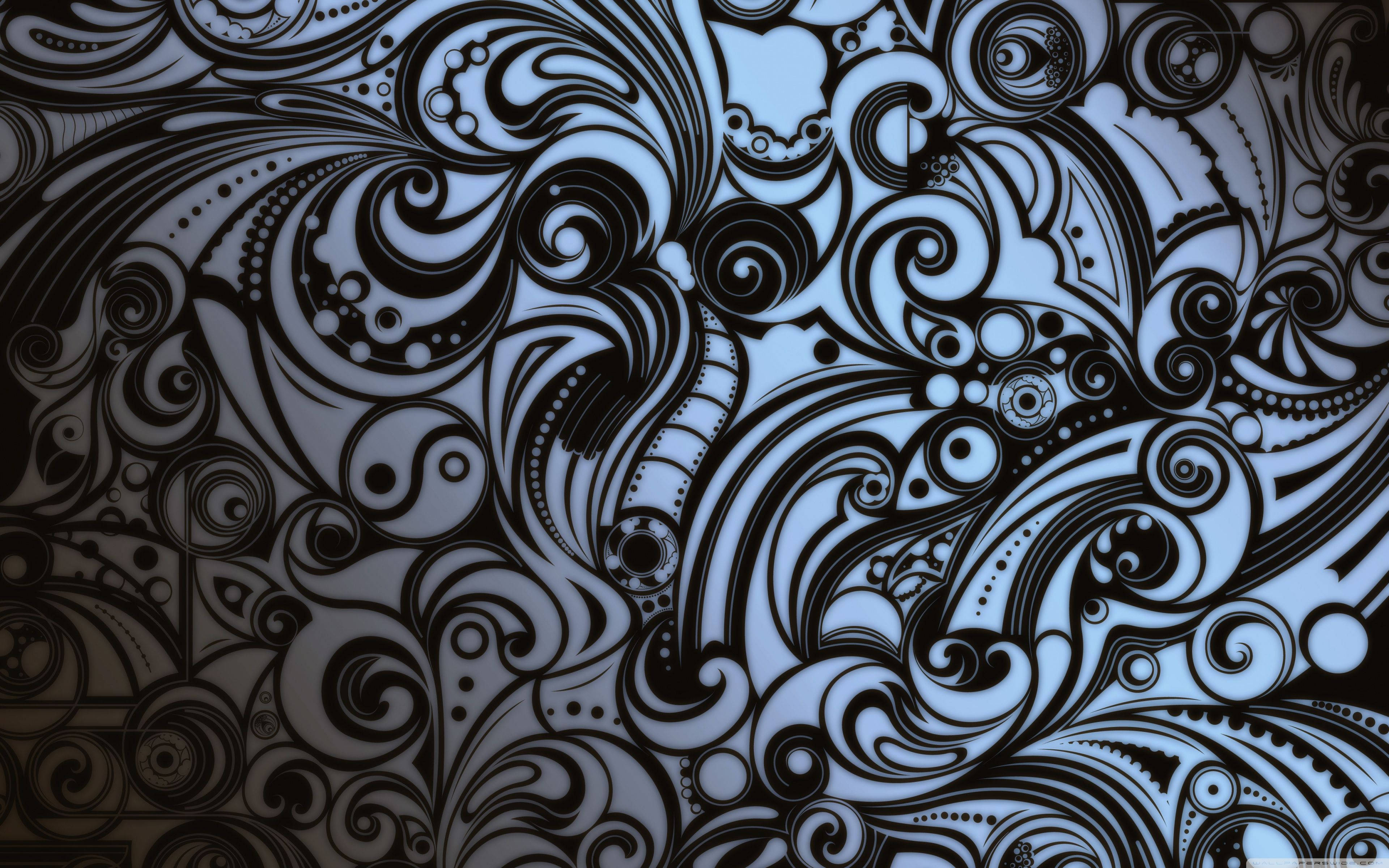 黑色部落圖形 壁紙 — 一個複雜的黑色和淺藍色抽象圖案，由旋轉的有機形狀和圓點組成，充滿了畫面。