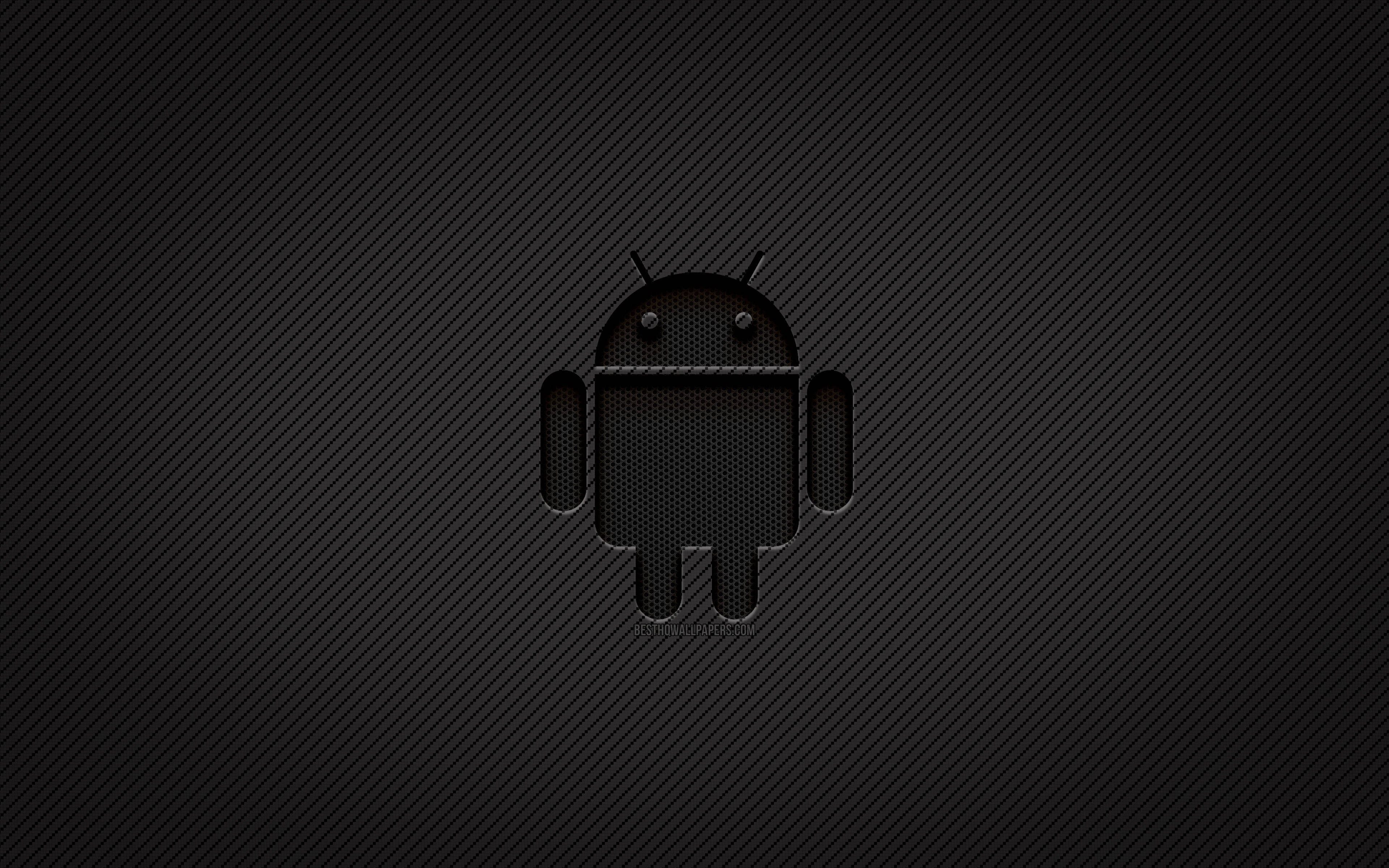 黑色金屬網格安卓桌面 壁紙 — Android 機械人標誌居中於深色碳纖維紋理背景上，帶有微妙的對角線。